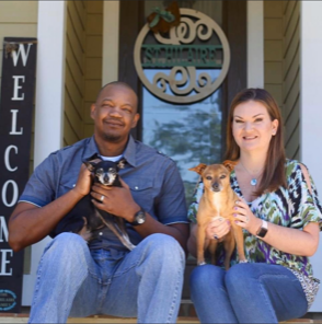 Karen colemen with dogs and husband